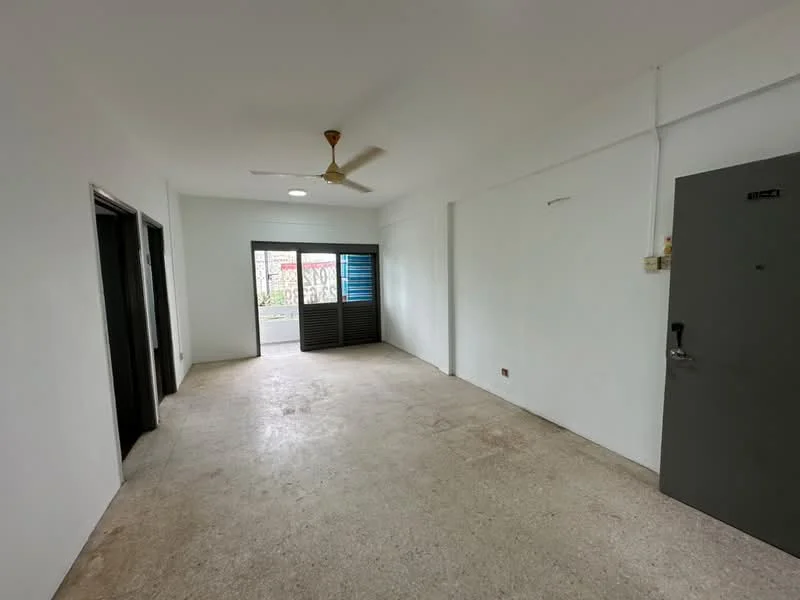 Room features: white painted walls, concrete flooring, ceiling fan, sliding glass door, floor-to-ceiling windows, natural light from windows, door to exterior, no visible furniture.