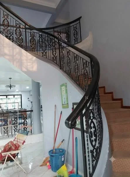 Room features: curved staircase with wrought iron railing, carpeted steps, light grey painted walls, white ceiling, recessed lighting, tile flooring, cleaning supplies visible, decorative wall features; style: modern.