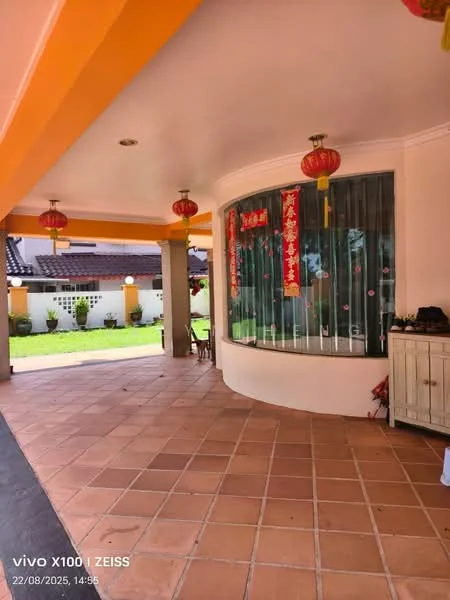 Exterior features: terracotta tile flooring, curved glass window, decorative red lanterns, yellow painted ceiling, white painted walls, green lawn, outdoor seating area, decorative wall with Chinese characters; style: traditional.