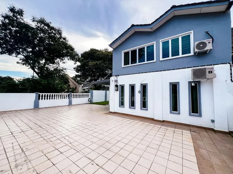 Exterior type: detached bungalow; features: blue painted facade, white painted walls, flat roof, approximately 2-storey, tiled flooring, multiple windows, air conditioning unit, manicured landscaping, fenced perimeter, outdoor patio area; style: modern.