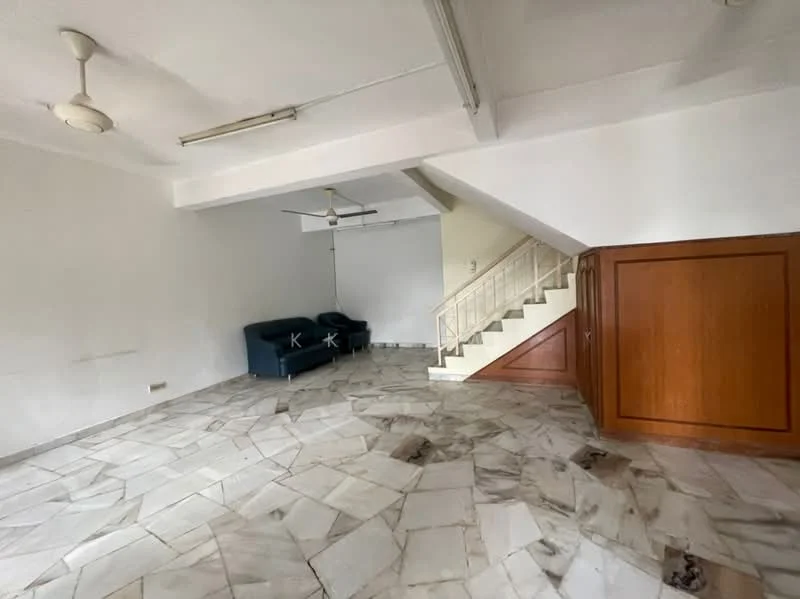 Living features: marble flooring, white painted walls, 5-blade ceiling fan, 2-seater fabric sofa in navy blue, staircase with wooden railing, natural light from windows, open layout, no visible decor.