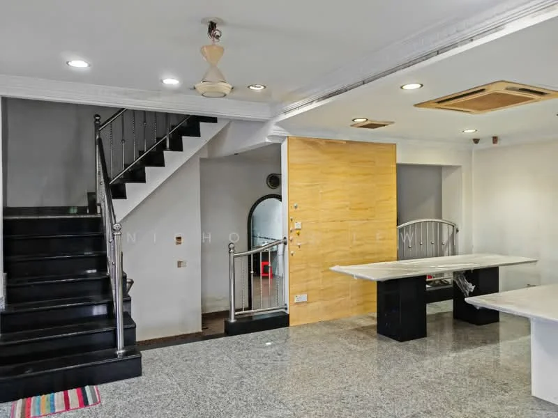 Living features: grey marble flooring, white painted walls, crown moulding, 5-blade ceiling fan, recessed downlights, open layout, stainless-steel railing, staircase leading to upper floor, kitchen island with countertop, wooden cabinetry, wall-mounted air conditioning unit; style: modern.