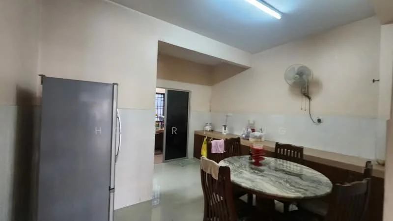 Kitchen features: grey stainless-steel fridge, round marble dining table, wooden dining chairs, wall-mounted ceiling fan, white tiled walls, cream painted walls, polished floor, sink, kitchen cabinetry, doorway to another room.