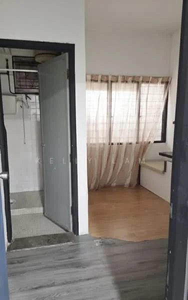 Room features: light wood laminate flooring, white painted walls, large window with sheer curtains, open layout, grey tiled flooring in bathroom area, shower area with glass partition, wall-mounted sink, exposed plumbing, natural light from window; style: modern.