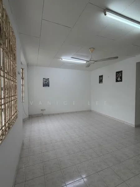 Room features: white painted walls, white ceiling, fluorescent lighting, ceiling fan, tiled flooring, window with wooden grille, two framed artworks on walls, corner electrical outlet; style: minimalist.