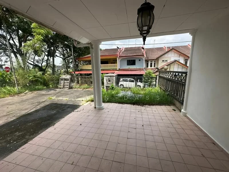 Room features: tiled flooring, covered porch, white ceiling, columns supporting the roof, outdoor view, surrounding greenery, fenced perimeter, adjacent driveway; view: garden.