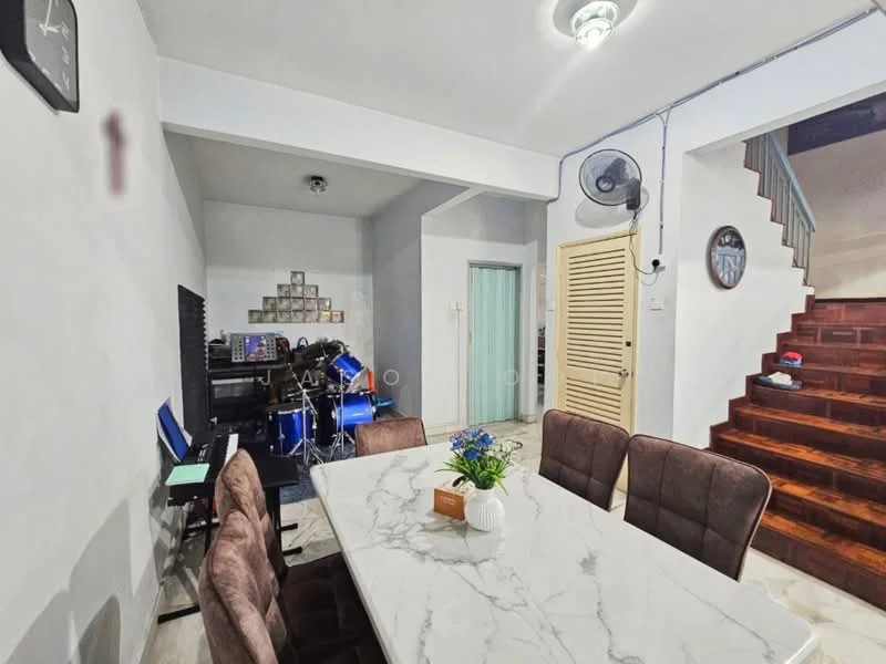 Dining features: marble dining table, upholstered dining chairs, ceiling light fixture, wooden staircase, wall-mounted fan, decorative wall art, wooden flooring, light grey painted walls; style: modern. Room features: musical instruments, shelving unit, doorway leading to another room.