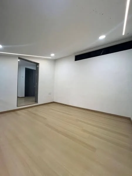 Room features: white painted walls, wooden flooring, recessed LED downlights, large window, mirror on wall, minimalist design; style: modern.
