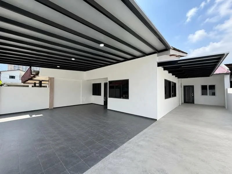 Exterior features: flat roof with exposed beams, white painted facade, large windows, grey tiled flooring, open outdoor space, covered patio area, concrete walls, surrounded by greenery; style: modern.