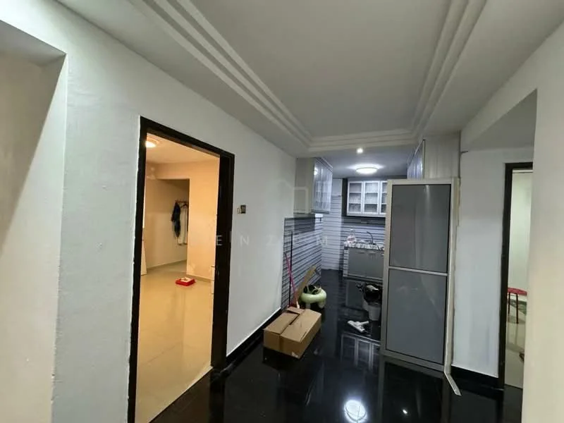 Room features: white painted walls, black polished floor tiles, recessed downlights, doorway leading to another room, doorway leading to kitchen area, built-in cabinets, open space layout, ceiling with decorative moulding; style: modern.
