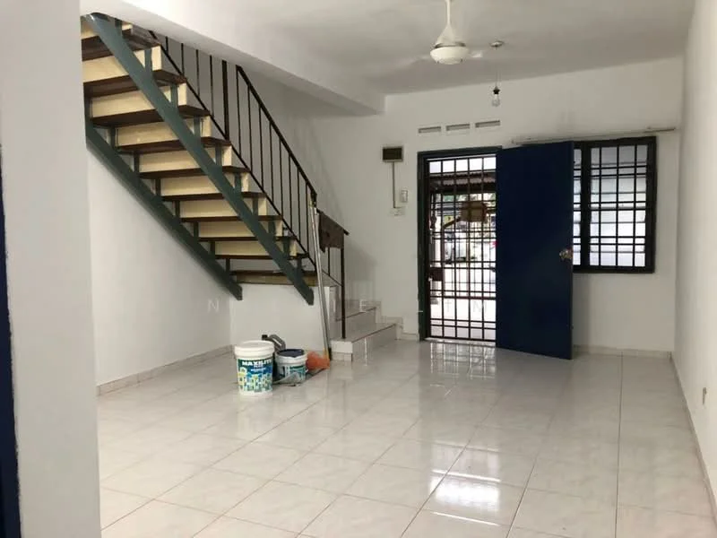 Room features: white painted walls, glossy ceramic tile flooring, staircase with wooden steps and metal railing, ceiling fan, large window with black grille, blue door, paint buckets, orange paint can, light switch, wall-mounted electrical outlet; style: modern.