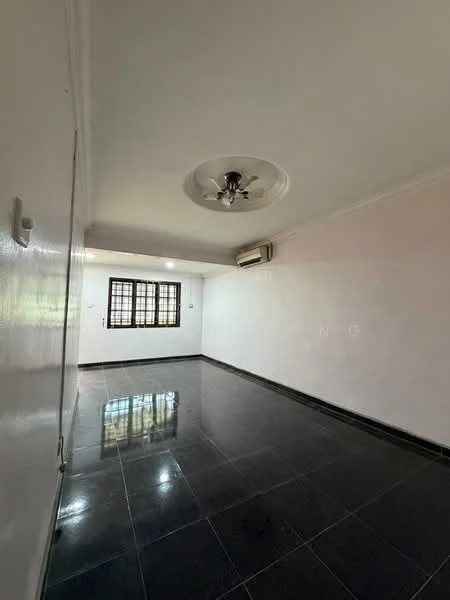 Room features: white painted walls, black polished tile flooring, tray ceiling, ceiling fan, window with grille, air conditioning unit, light fixture, no visible furniture.