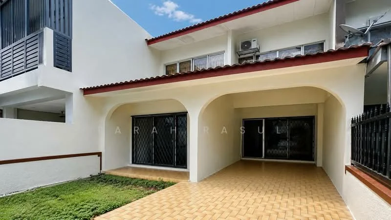 Exterior type: semi-detached house; features: arched entrance, paved flooring, manicured lawn, black metal grille, red tiled roof, two-storey structure, air conditioning unit visible, outdoor space, surrounded by greenery; style: modern.
