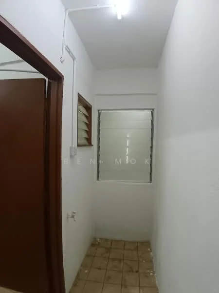 Room features: white painted walls, tile flooring, single window with horizontal slats, light fixture on ceiling, wooden door, door frame, plumbing fixture on wall.