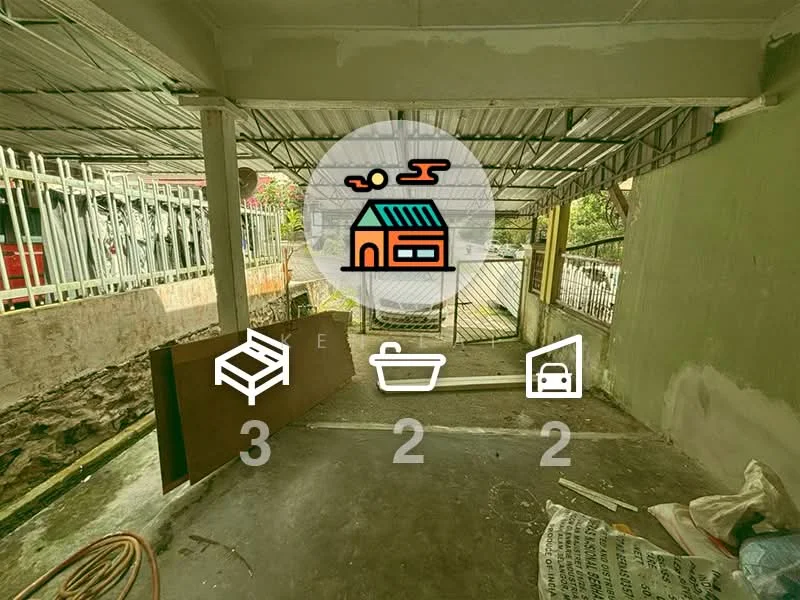 Room features: concrete flooring, metal roof, exposed beams, green painted walls, open space layout, partially furnished, natural light from windows, access to outdoor area.