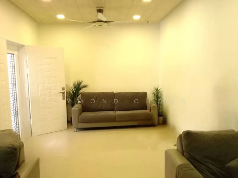 Living features: 3-seater fabric sofa in grey, 2-seater fabric sofa in grey, ceiling fan, white painted walls, cream tiled flooring, indoor plants in ceramic pots, large white door, natural light from windows; style: modern.