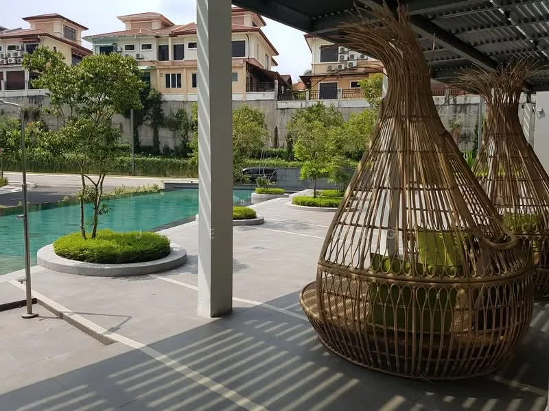 Exterior type: landscape garden; features: swimming pool, manicured lawn, tropical landscaping, decorative stone planters, outdoor seating area with wicker chairs, paved walkway, surrounding greenery, multi-storey residential buildings in background; style: modern.