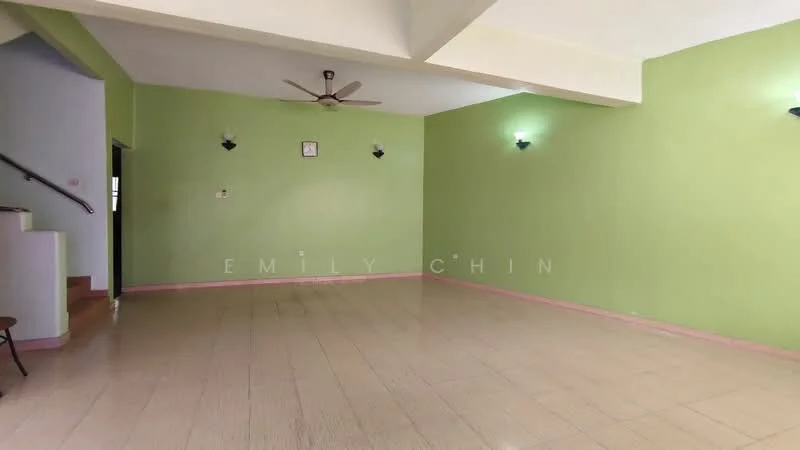 Living features: green painted walls, cream tiled flooring, 5-blade ceiling fan, 2 wall sconces, no visible furniture, open space layout, corner staircase, pink baseboards.