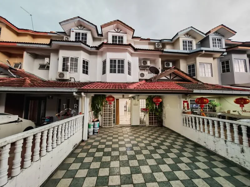 Exterior type: linked terrace house; features: two-storey building, red tiled roof, white painted facade, balcony with decorative railing, multiple air conditioning units visible, checkerboard patterned driveway, lantern decorations, front porch area, windows with white frames, gated entrance; style: modern.