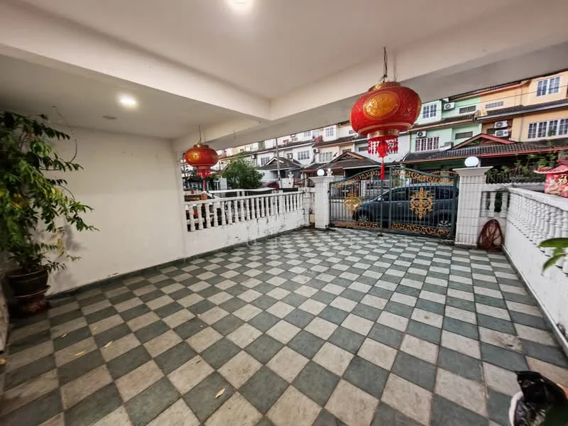 Exterior type: linked terrace house; features: checkerboard tile flooring, covered porch area, decorative red lanterns, white railing, manicured plants, gated entrance, surrounded by residential buildings; style: modern.