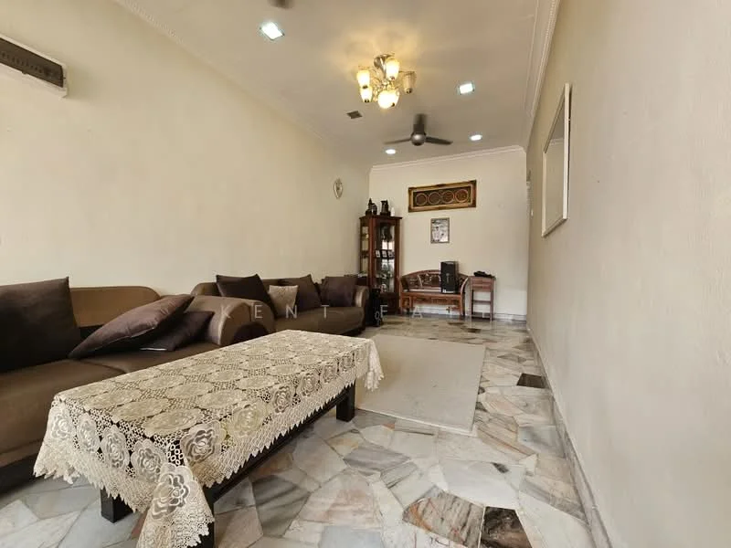 Living features: 3-seater fabric sofa in brown, 2-seater fabric sofa in brown, coffee table with lace tablecloth, marble flooring, cream painted walls, ceiling fan, wall-mounted air conditioning unit, decorative wall mirror, wooden display cabinet, framed artwork on wall; style: traditional.
