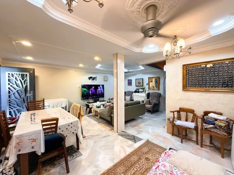 Living features: marble flooring, tray ceiling with decorative moulding, 5-blade ceiling fan with light, wall-mounted TV, sofa in green fabric, coffee table, area rug with traditional pattern, decorative wall art, framed artwork, recessed lighting; style: traditional. Dining features: 6-seater dining table, tablecloth with floral pattern, wooden dining chairs, decorative centerpiece, open layout to living area; style: traditional.