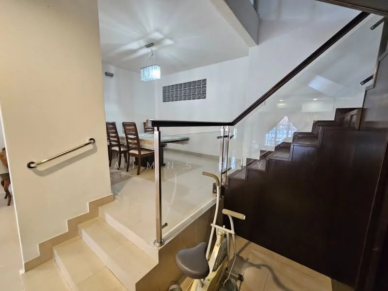 Room features: staircase with wooden steps, glass railing, white painted walls, recessed ceiling lights, ceiling fan, tile flooring, exercise bike, dining table in background, large windows, open layout; style: modern.