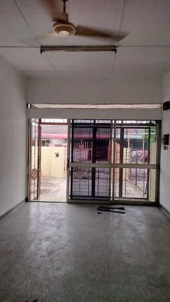 Room features: white painted walls, concrete flooring, ceiling fan, sliding glass door, grill door, large windows, natural light, open layout.