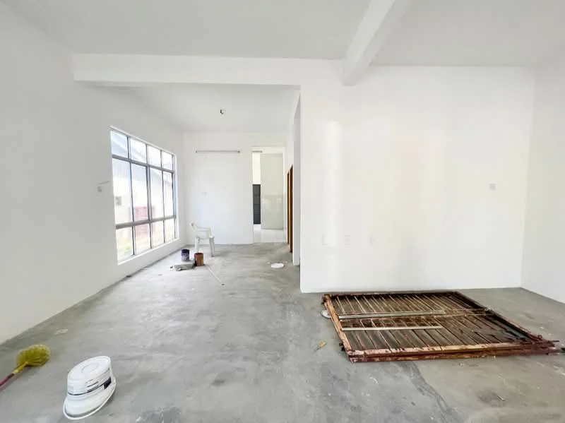 Room features: white painted walls, concrete flooring, large windows, unfinished floor area, visible broom, paint bucket, open layout, ceiling beams; style: modern.