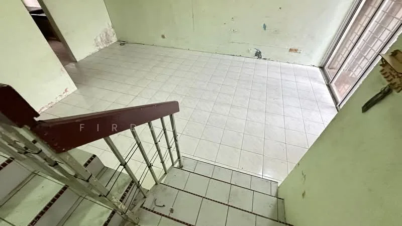 Room features: white painted walls, light-colored tiled flooring, staircase with metal railing, large sliding glass door, natural light from sliding door, empty space, no visible furniture, unfinished wall areas.