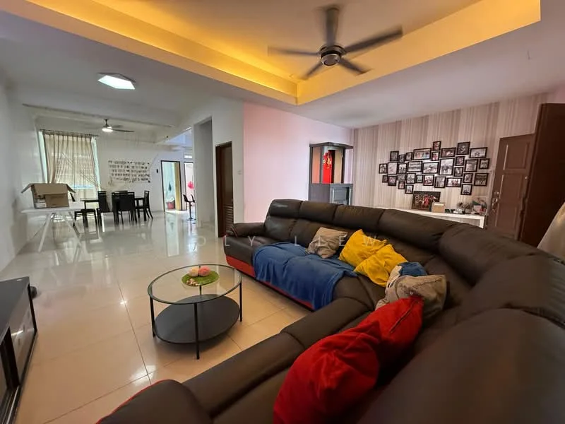 Living features: L-shape sectional sofa in dark brown, red and yellow throw pillows, coffee table with round glass top, wall-mounted TV, entertainment unit, recessed downlights, ceiling fan, cream painted walls, white tiled flooring, decorative wall with photo frames; style: modern. Dining features: 4-seater dining table, black dining chairs, white walls, natural light from windows; style: modern.