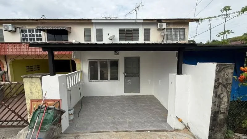 Exterior type: linked terrace house; features: flat roof with overhang, white painted facade, grey tiled flooring, single main entrance door, front porch area, two wall-mounted air conditioning units, fenced boundary, visible outdoor space, manicured landscaping, utility area on the side; style: modern.