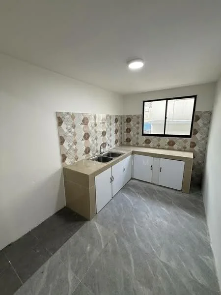 Kitchen features: single-bowl stainless-steel sink, chrome pull-down faucet, laminate countertop, white cabinetry with flat-panel doors, decorative backsplash with geometric pattern, grey tile flooring, recessed ceiling light, window for natural light; style: modern.