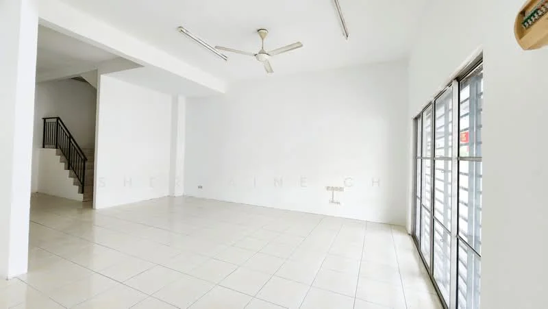 Living features: white painted walls, tile flooring, 5-blade ceiling fan, large sliding glass door, natural light from windows, open layout, staircase visible in background, no visible furniture; style: minimalist.