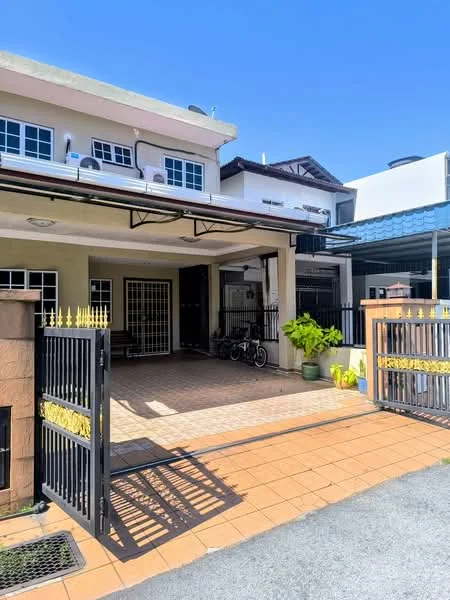 Exterior type: linked terrace house; features: gated entrance, paved driveway, manicured garden, front porch, metal gate, two-storey structure, air conditioning units visible, tiled flooring, adjacent houses visible, clear blue sky; style: modern.