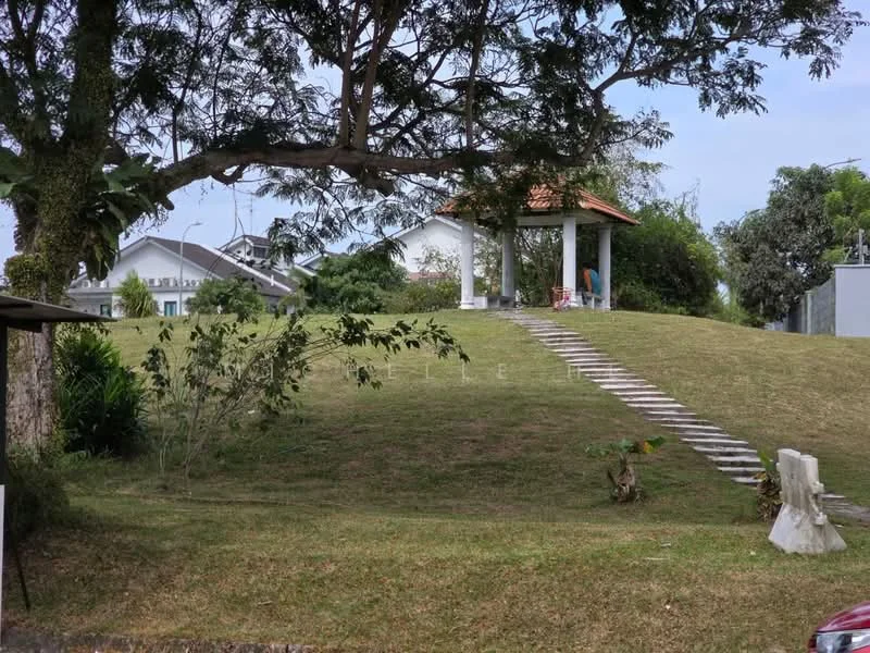 Exterior type: landscape garden; features: manicured lawn, mature trees, stone-paved walkway, gazebo with roof, sloped terrain, surrounded by greenery; style: tropical-modern.