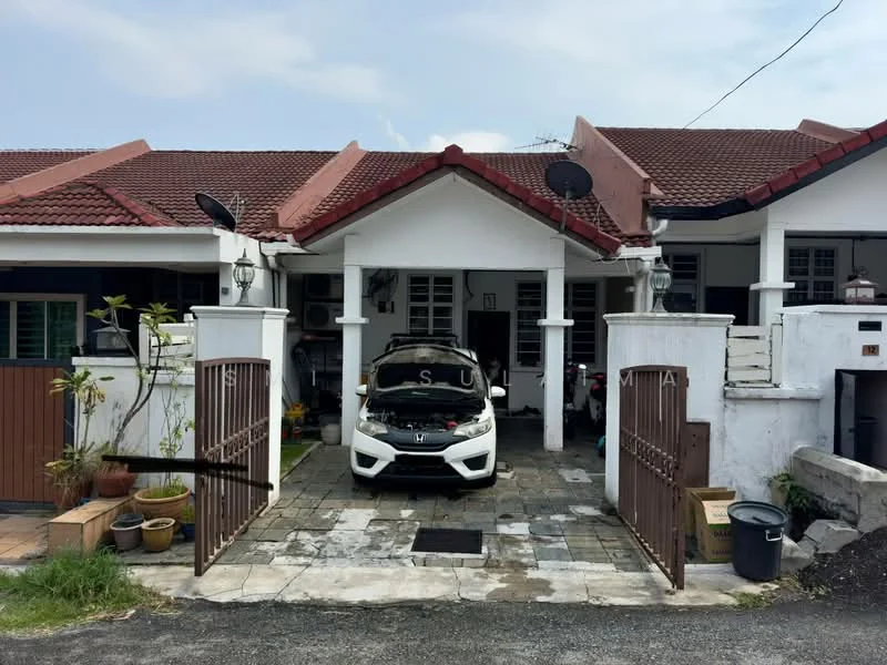 Exterior type: linked terrace house; features: red tiled roof, white painted facade, stone-paved driveway, front gate with metal bars, two-car porch, outdoor plants in pots, satellite dishes on roof, exposed brick wall, manicured lawn, sidewalk, visible vehicles in driveway; style: traditional.