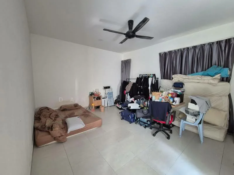 Room features: white painted walls, light grey tiled flooring, 5-blade ceiling fan, floor-to-ceiling window with grey curtains, queen-size mattress on the floor, unmade bed with brown bedding, stack of mattresses, clothes on hangers, wooden bedside table, various bags and boxes, plastic chair; style: minimalist.