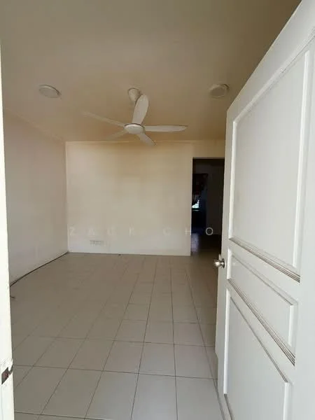 Room features: plain white walls, tiled flooring, ceiling fan, door with panel design, light fixtures in ceiling, empty space.