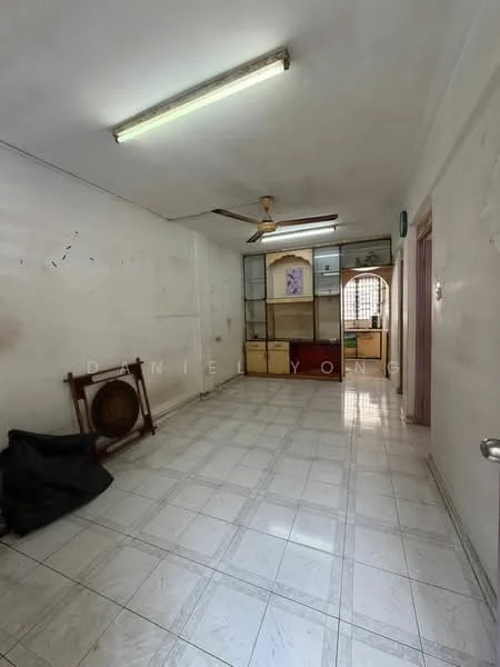 Room features: white painted walls, ceramic tile flooring, ceiling fan, fluorescent lighting, glass display cabinet, wooden storage unit, open space layout, window with security grille.