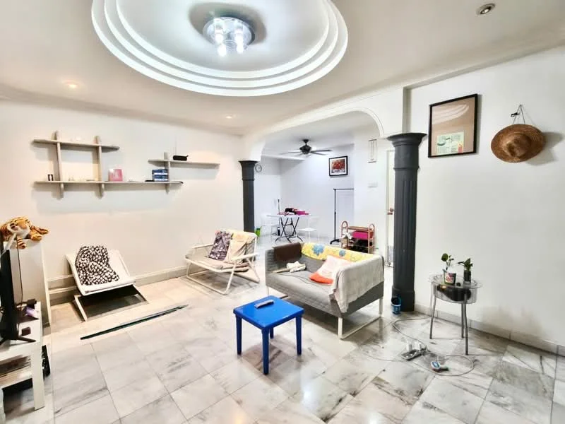 Living features: marble tile flooring, white painted walls, tray ceiling with recessed lighting, ceiling fan, 2 lounge chairs, sofa, coffee table, decorative wall shelf, framed artwork, wall clock, small side table, houseplants in ceramic pots; style: modern. Room features: open layout, visible dining area, additional furniture in background.