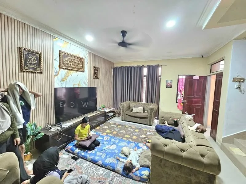 Living features: wood panelled accent wall, marble feature wall, large flat-screen TV, 3-seater fabric sofa in beige, 2-seater fabric sofa in beige, area rug with floral pattern, ceiling fan, curtains in grey, decorative wall art, coffee table, potted plant, flooring in tiles; style: contemporary.