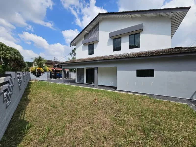 Exterior type: detached bungalow; features: white painted facade, flat roof, two-storey structure, manicured lawn, surrounded by low wall, large windows, outdoor space, concrete pathway; style: modern.