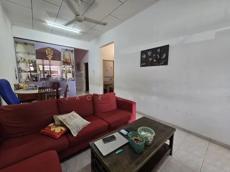 Living features: red fabric sofa, wooden coffee table, ceramic tile flooring, white painted walls, ceiling fan, decorative wall art, area rug, window with sheer curtains; style: modern. Kitchen features: open layout to living area, kitchen counter, wooden dining table, chairs, visible kitchen appliances; style: modern. Room features: doorway leading to other rooms.