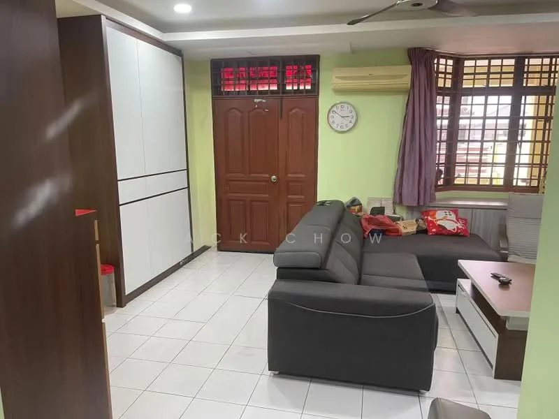 Living features: grey fabric sectional sofa, white coffee table, wall-mounted clock, white tiled flooring, green painted walls, air conditioning unit, curtains in purple, wooden door, built-in cabinetry with white finish, decorative wall paneling, window with wooden grille, light ceiling with recessed lighting; style: modern.