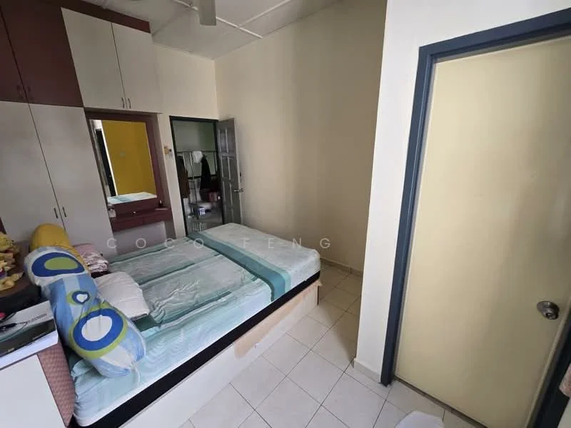 Bedroom features: single bed with mattress, built-in wardrobe with sliding doors, white painted walls, cream tiled flooring, desk with mirror, decorative pillows, window with curtain, door leading to hallway.
