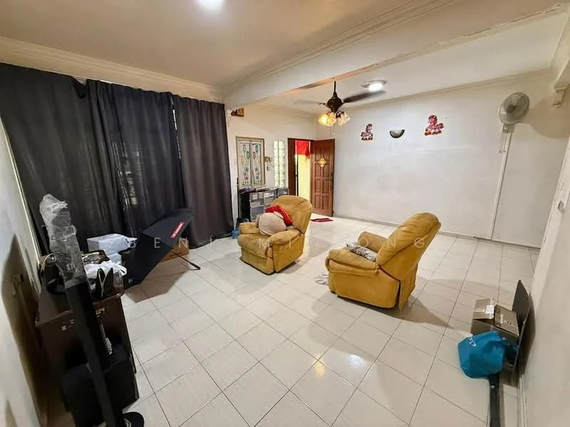 Living features: cream painted walls, white ceiling, tile flooring, 2 yellow recliner chairs, black folding table, curtains in dark grey, wall-mounted fan, light fixture with pendant, doorway leading to another room, decorative wall art, area rug.