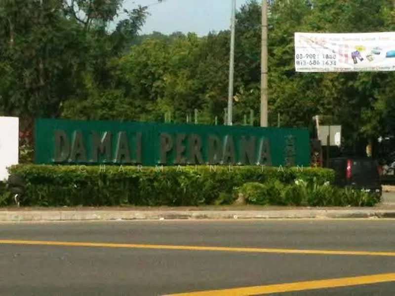 Exterior features: signage with 'Damai Perdana', landscaped greenery, roadside view, paved road, street lighting, surrounding trees; style: modern.