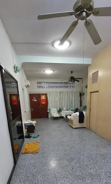 Living features: 5-blade ceiling fan, recessed ceiling lights, grey speckled tile flooring, white painted walls, large mirror on wall, sofa in cream color, curtains in light fabric, coffee table, side table, air conditioning unit; style: modern.