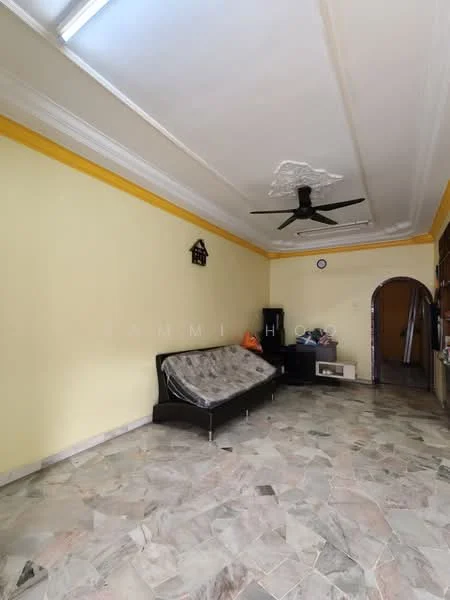 Living features: yellow painted walls, marble flooring, 5-blade ceiling fan, sofa with fabric upholstery, decorative wall clock, arched doorway, built-in cabinet, window with natural light.